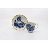 A Worcester blue and white coffee cup and saucer, 'European Landscape' pattern, circa 1775-85,