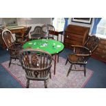 Four 19thC Windsor chairs with elm seats.