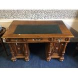 A Continental Gothic oak writing desk