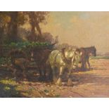 Arthur Spooner (British, 1873-1962), a farmer loading a horse drawn cart with cabbages, signed l.l.,