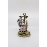 A Meissen figure group of a lady, gentleman and child sitting by a tree.  Date late 19th century'