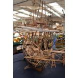 Model of a ship on stand,