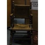 A mid 19th Century Elm children's rocking chair