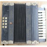 A Ludwig Piano Tone accordion (Melodeon with piano keys)
