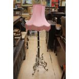 One standard lamp with pink shade