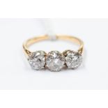 A diamond 18ct yellow gold three-stone ring,