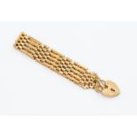 A 9ct gold five link gate bracelet, padlock clasp, weight approx. 20.5gms.