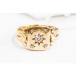 A gold and diamond gypsy set ring, set with a round diamond approx 0.