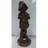 A 20th Century bronze study of a girl feeding a bird,