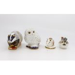 Collection of four Royal Crown Derby paper weights and figures,