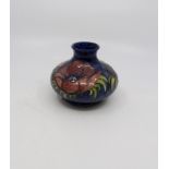 Moorcroft vase, blue ground, Anemone design, 10 cms high,