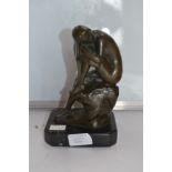20th Century bronze figure of a lady on a rock