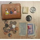 Coins and banknotes in purse,