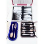 A collection of plated and silver items including a fish knife and fork set, spoons etc,