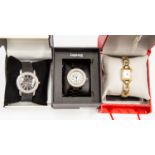 Three fashion watches, unworn, Guess,