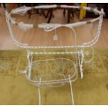 Two metal framed dolls cots,