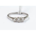 A platinum and diamond three-stone ring, size J½, total gross weight approx 2.