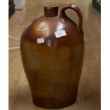 A large 19th Century stone ware flagon, single handle (A.