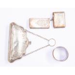 A silver vesta case, along with another and a napkin ring, combined total gross weight approx 2.