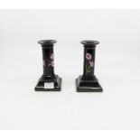 A pair of candlesticks of Mrs Delany's flowers by Sybil Connolly Tiffany & Co, marked to base,