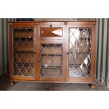 A 20th Century Oak Glazed Bookcase, Fall Front Cupboard with leather interior writing slope.