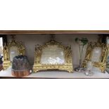 A set of three gilt cast religious plaques; a copper jelly mold; a silver and glass specimen vase;