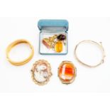 A collection of Victorian jewellery including a gilt metal cameo brooch,