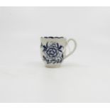 An uncommon Worcester blue and white coffee cup, decorated with 'The Scalloped Peony' pattern,