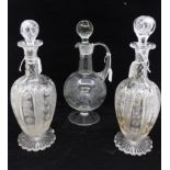 A pair of Victorian cut glass decanters, of shaft and globe form, one AF,