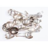 A collection of assorted silver plated flatware,