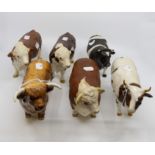 Six Beswick bulls, including three Hereford, one Ayrshire,