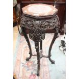 Large Chinese plant stand, hand carved with flowers and foliage,