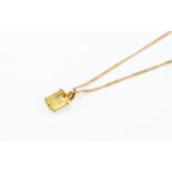 A lime Quartz and 9ct gold pendant and chain, rectangular quartz stone, total gross weight approx.