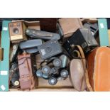 Collection of early to mid 20th Century cameras and binoculars, Brownies,