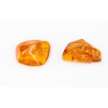 Two nuggets of amber (one with an insect)