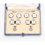 A set of mother of pearl white metal collar studs and buttons,