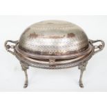 A mid Victorian breakfast chafing dish by James Dixon & Co Sheffield raised on rams legs with ram