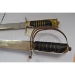 Indian made decorative sword with curved 76cm long blade with etched decoration. 89cm long overall.