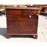 A George III mahogany chest of drawers circa 1770, having 2 short over 3 long graduated drawers,