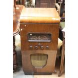 A mid 20th Century walnut radiogram