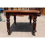 A late Victorian mahogany and pine topped dining table, the top probably later,