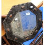 An Arts and Crafts style wooden mirror