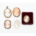 Four silver mounted cameos plus clear glass example (5)