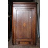 A George III Oak Corner Cupboard,