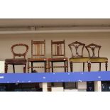 A collection of five various chairs, comprising a pair of Victorian dining chairs,