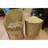 A Lloyd Loom chair along with a laundry basket