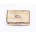 A George III silver gilt snuff box, engine turned rattan weave design,