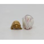 Two Royal Worcester netsukes comprising: a blush ivory netsuke modelled as a tortoise,