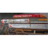 Four train sets including Hornby,