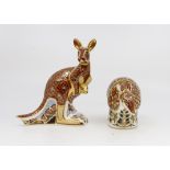 Two Royal Crown Derby paperweights including: Armadillo, gilt stopper,
